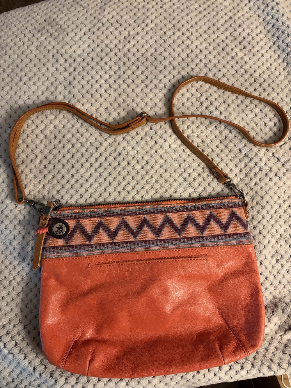 The Sak Coral Crossbody with Aztec Trim and Tan Strap